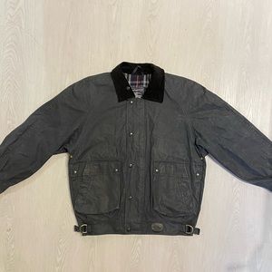 Burberry’s (now known as Burberry) vintage 80s/90s waxed cotton bomber jacket.